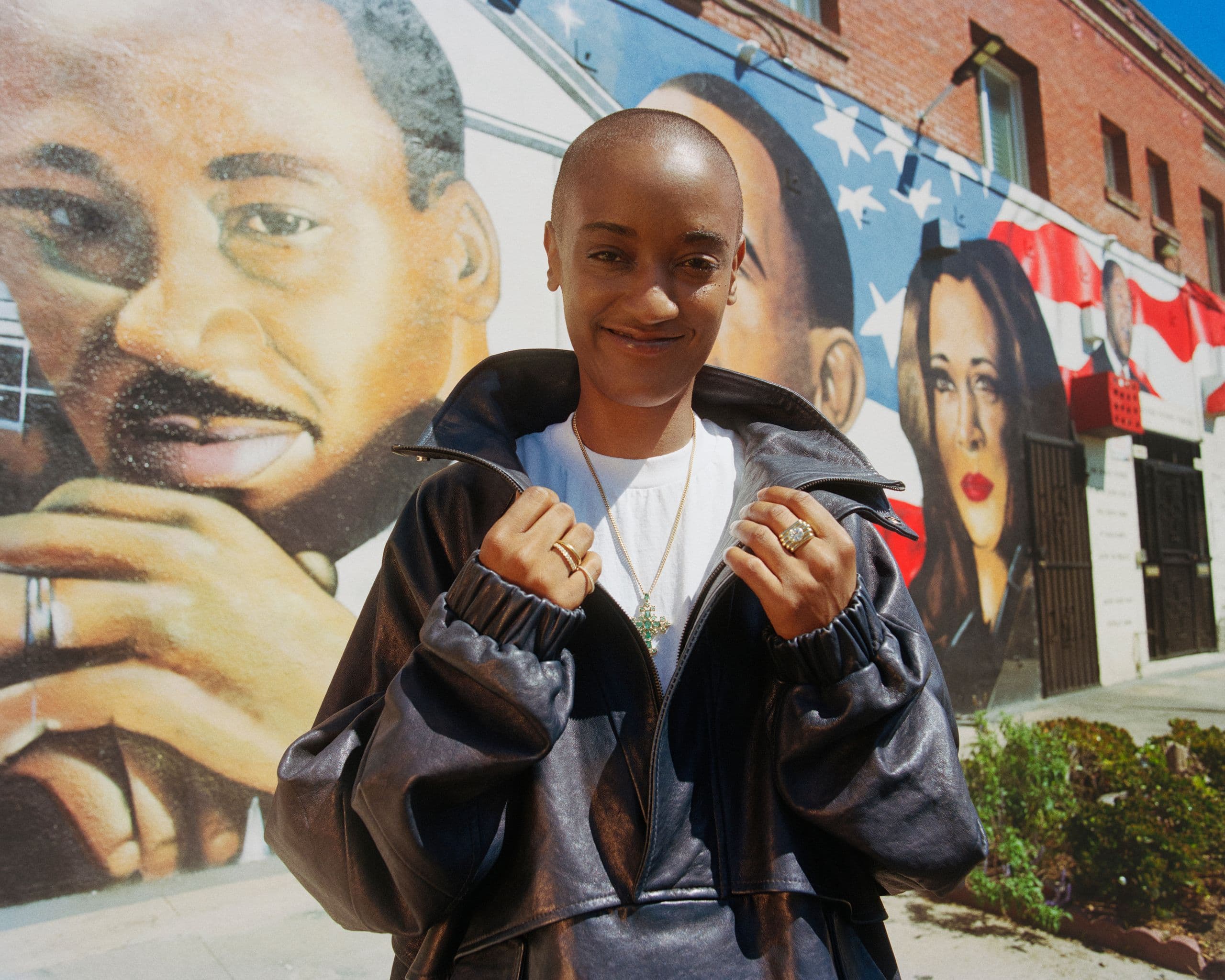 Syd in front of a mural in Los Angeles